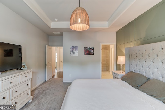 bedroom featuring a tray ceiling, baseboards, visible vents, light colored carpet, and ornamental molding
