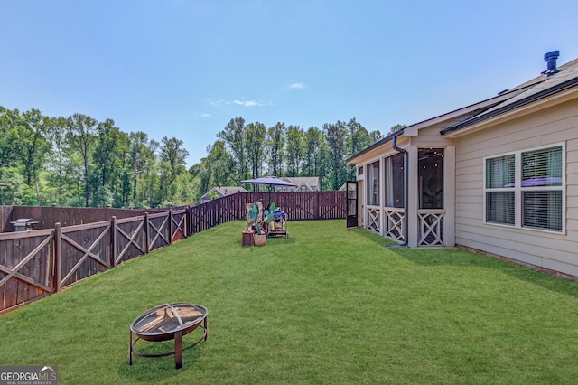 1380 Chester Way, Hoschton, GA 30548 - view of yard featuring a fire pit