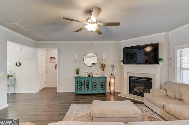living room featuring visible vents, a ceiling fan, dark wood-style floors, and ornamental molding