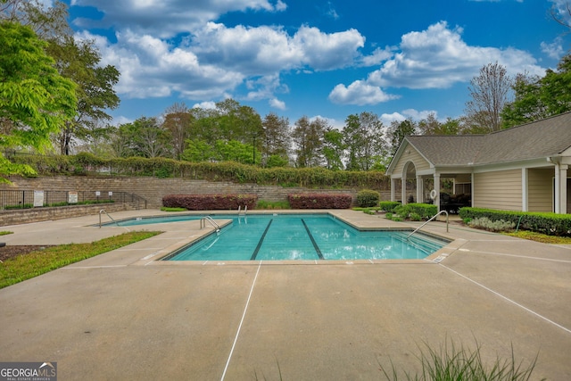 community pool featuring a patio