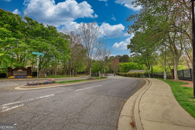 view of street with curbs and sidewalks