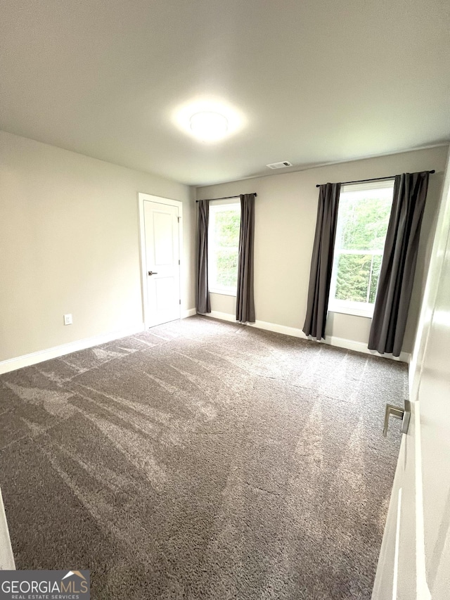 3 Highlander Trl SW, Rome, GA 30165 - carpeted spare room with baseboards