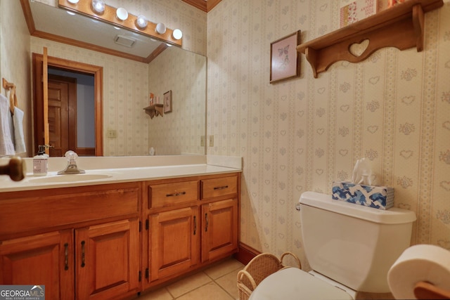 half bathroom featuring toilet, tile patterned flooring, ornamental molding, and vanity