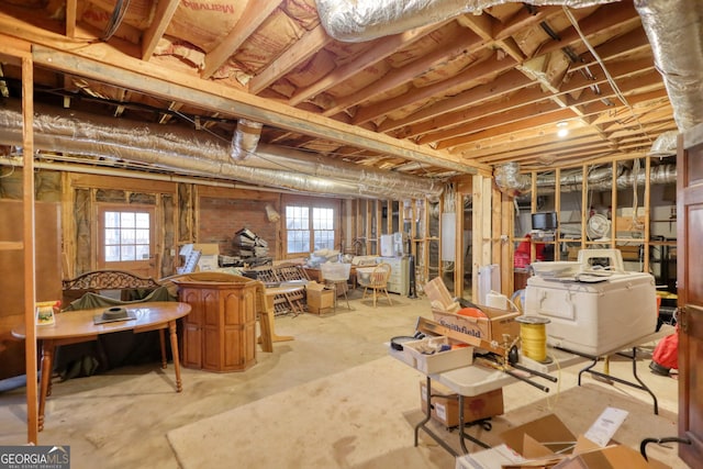 below grade area with washer / dryer and a healthy amount of sunlight