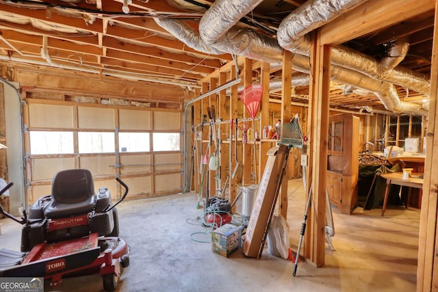 miscellaneous room featuring unfinished concrete floors