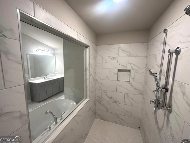 165 Jodi Pl, Locust Grove, GA 30248 - bathroom featuring marble finish floor, a garden tub, vanity, and tiled shower