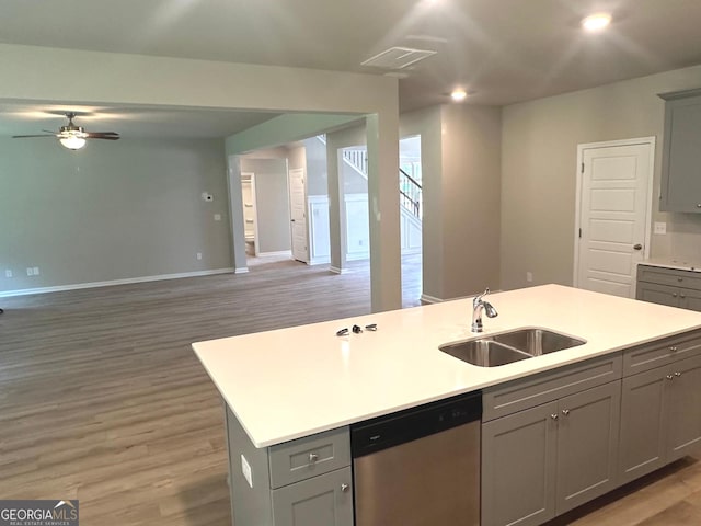 165 Jodi Pl, Locust Grove, GA 30248 - kitchen with gray cabinets, stainless steel dishwasher, open floor plan, and a sink