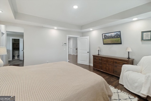 bedroom featuring recessed lighting and dark wood finished floors