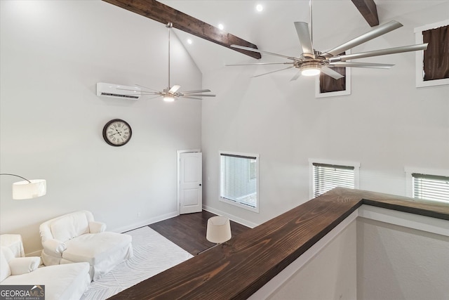 living area with a wall mounted AC, baseboards, high vaulted ceiling, and ceiling fan