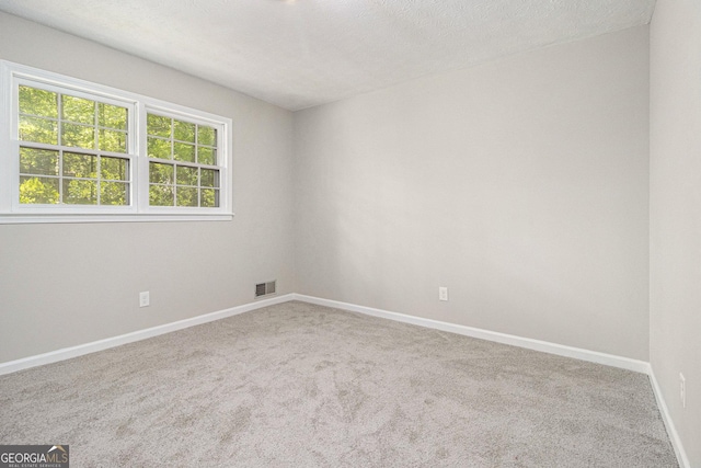 20 King Pl, Stockbridge, GA 30281 - empty room with baseboards, carpet flooring, and visible vents