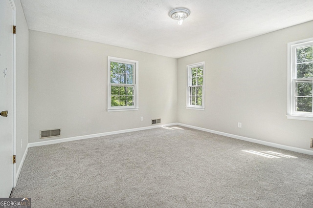 20 King Pl, Stockbridge, GA 30281 - unfurnished room with carpet, visible vents, and baseboards