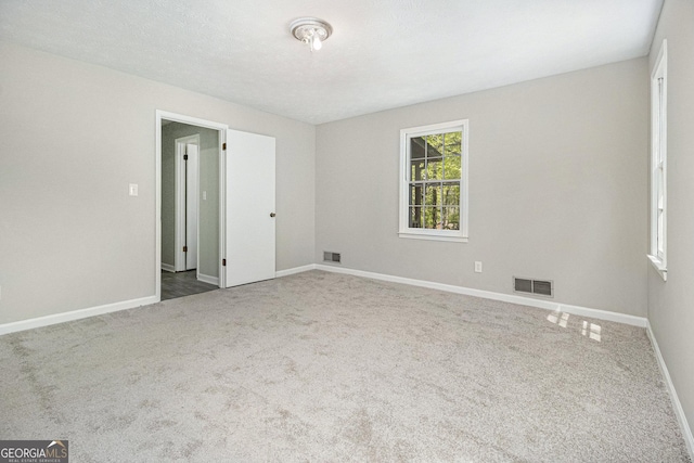 20 King Pl, Stockbridge, GA 30281 - carpeted spare room featuring visible vents and baseboards