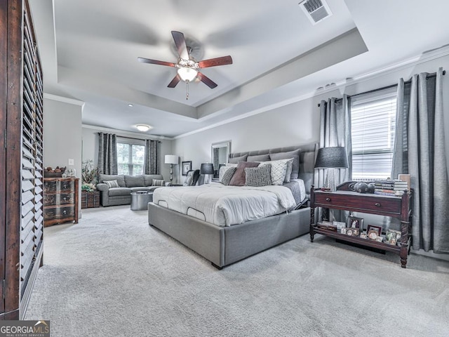 130 Maple Creek Way, Woodstock, GA 30188 - carpeted bedroom with crown molding, a raised ceiling, ceiling fan, and visible vents