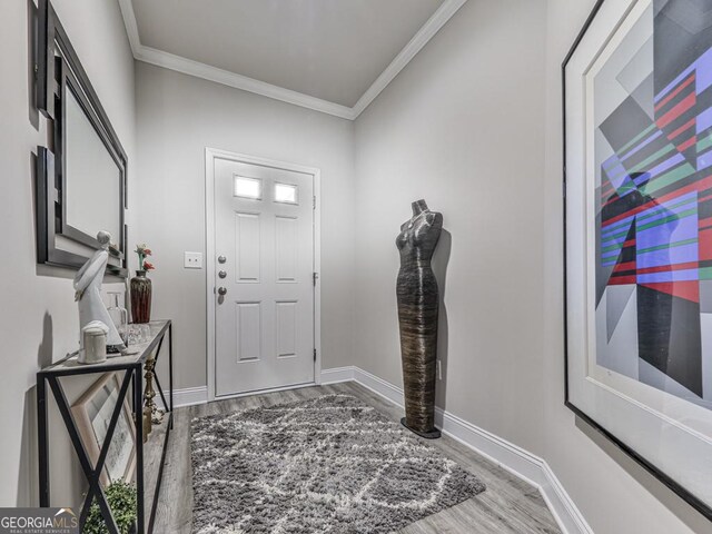 130 Maple Creek Way, Woodstock, GA 30188 - foyer entrance with baseboards, ornamental molding, and wood finished floors