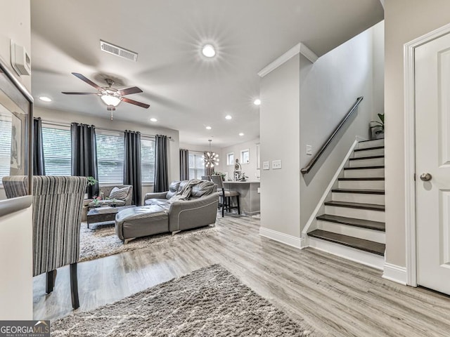 130 Maple Creek Way, Woodstock, GA 30188 - living area with ceiling fan, visible vents, wood finished floors, stairway, and recessed lighting