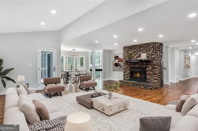 100 Little Ridge Rd, Berkeley Lake, GA 30096 - living room featuring wood finished floors, recessed lighting, and a fireplace