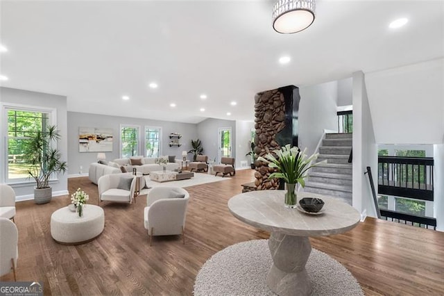 100 Little Ridge Rd, Berkeley Lake, GA 30096 - living room featuring recessed lighting, plenty of natural light, wood finished floors, and stairway