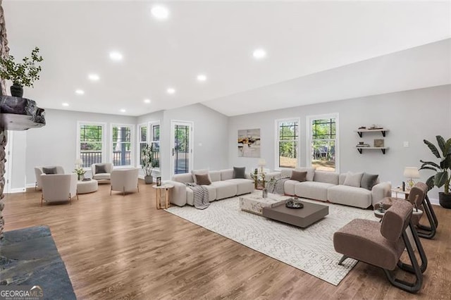 100 Little Ridge Rd, Berkeley Lake, GA 30096 - living area featuring plenty of natural light, recessed lighting, wood finished floors, and vaulted ceiling