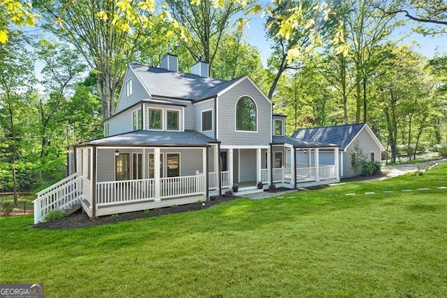 100 Little Ridge Rd, Berkeley Lake, GA 30096 - rear view of house featuring a porch, a chimney, and a yard