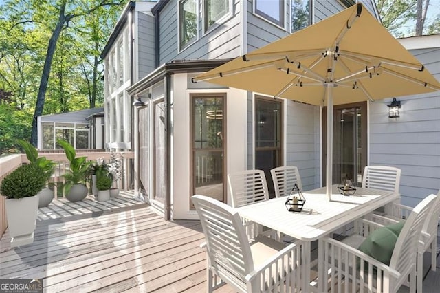 100 Little Ridge Rd, Berkeley Lake, GA 30096 - deck with outdoor dining area and a sunroom