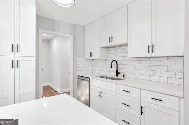 100 Little Ridge Rd, Berkeley Lake, GA 30096 - kitchen featuring dishwasher, white cabinetry, and decorative backsplash