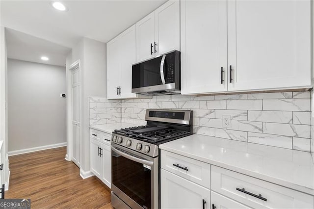 100 Little Ridge Rd, Berkeley Lake, GA 30096 - kitchen featuring appliances with stainless steel finishes, light countertops, white cabinetry, and recessed lighting