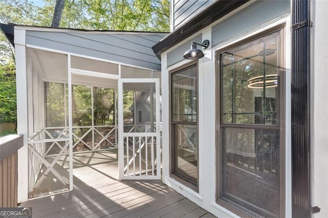 100 Little Ridge Rd, Berkeley Lake, GA 30096 - wooden deck with a sunroom