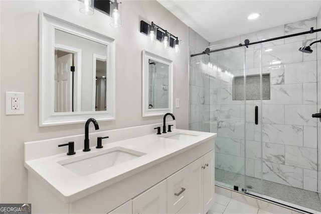 100 Little Ridge Rd, Berkeley Lake, GA 30096 - bathroom featuring a stall shower, double vanity, and recessed lighting