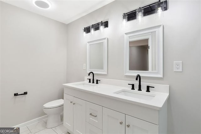100 Little Ridge Rd, Berkeley Lake, GA 30096 - bathroom featuring baseboards and double vanity