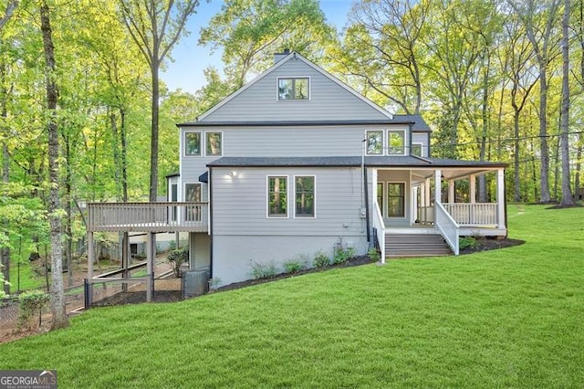 100 Little Ridge Rd, Berkeley Lake, GA 30096 - rear view of property featuring covered porch and a lawn
