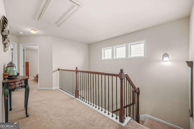 5030 Breezewood Cir, Alpharetta, GA 30004 - hall featuring attic access, baseboards, carpet floors, and an upstairs landing