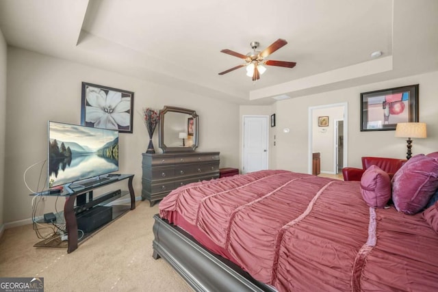 5030 Breezewood Cir, Alpharetta, GA 30004 - carpeted bedroom with baseboards, a ceiling fan, and a raised ceiling