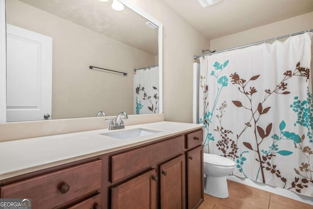 5030 Breezewood Cir, Alpharetta, GA 30004 - bathroom featuring vanity, toilet, a shower with curtain, and tile patterned flooring