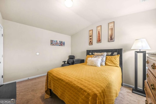 5030 Breezewood Cir, Alpharetta, GA 30004 - bedroom with vaulted ceiling, carpet floors, and baseboards