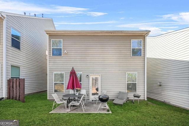 5030 Breezewood Cir, Alpharetta, GA 30004 - back of property featuring a lawn and a patio area