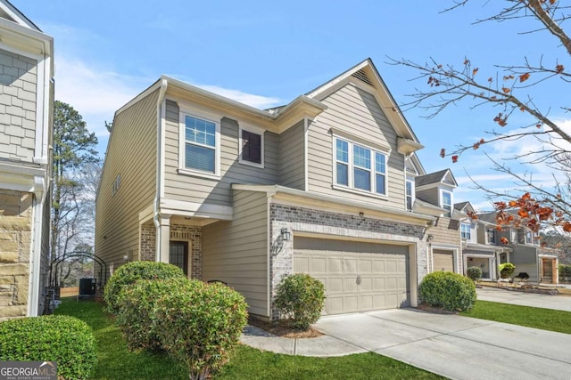 5030 Breezewood Cir, Alpharetta, GA 30004 - view of front of property with brick siding, driveway, and a garage