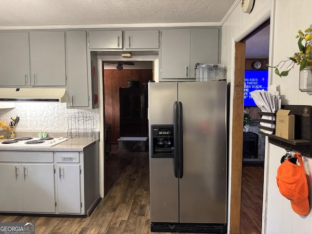 3065 County Road 69, Centre, AL 35960 - kitchen with stainless steel fridge, gray cabinetry, range hood, white electric stovetop, and dark wood finished floors