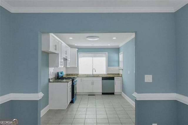 4175 Danforth, Atlanta, GA 30331 - kitchen with appliances with stainless steel finishes, white cabinetry, light tile patterned floors, crown molding, and under cabinet range hood