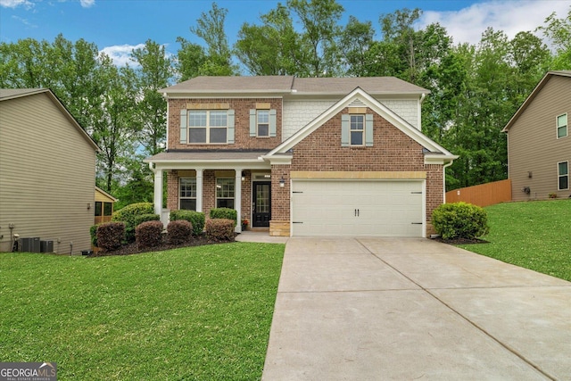 4240 Spring Rdg, Cumming, GA 30028 - craftsman house featuring concrete driveway, brick siding, covered porch, and a shingled roof