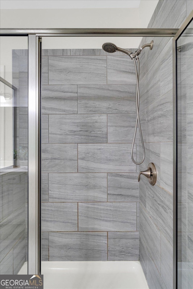 4240 Spring Rdg, Cumming, GA 30028 - bathroom featuring a garden tub, a shower stall, and double vanity