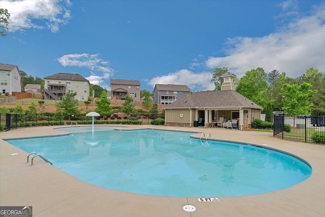 4240 Spring Rdg, Cumming, GA 30028 - community pool featuring a patio and a residential view