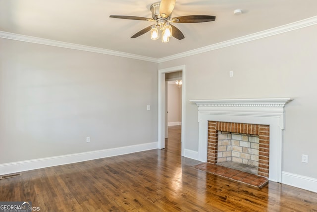 1531 E Broad St, Greensboro, GA 30642 - unfurnished living room with wood finished floors, visible vents, a ceiling fan, crown molding, and baseboards