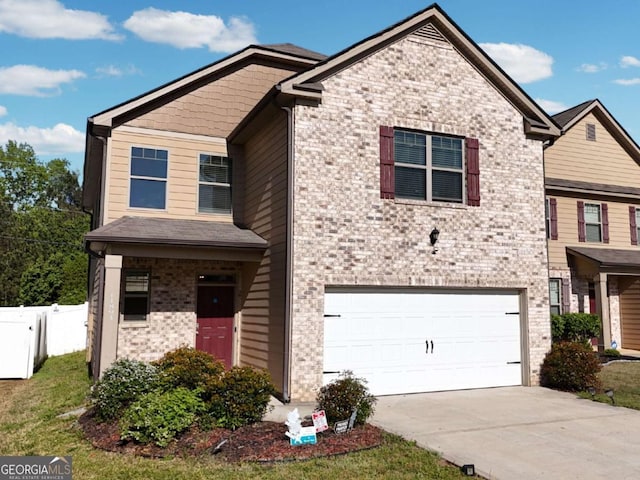 11893 Lovejoy Crossing Blvd, Hampton, GA 30228 - view of front of property with an attached garage, driveway, and brick siding