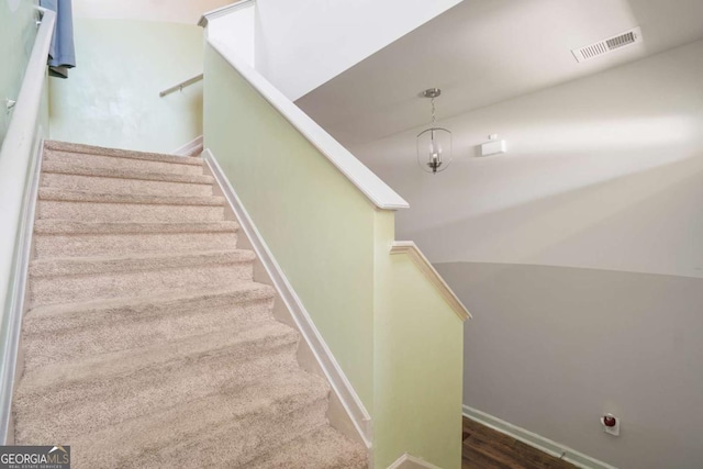 11893 Lovejoy Crossing Blvd, Hampton, GA 30228 - staircase featuring wood finished floors