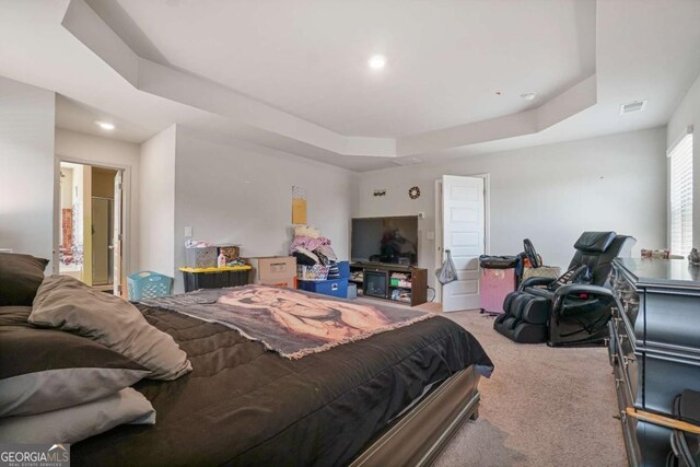 11893 Lovejoy Crossing Blvd, Hampton, GA 30228 - carpeted bedroom with a tray ceiling and recessed lighting