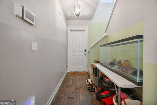 11893 Lovejoy Crossing Blvd, Hampton, GA 30228 - doorway to outside with wood finished floors and baseboards