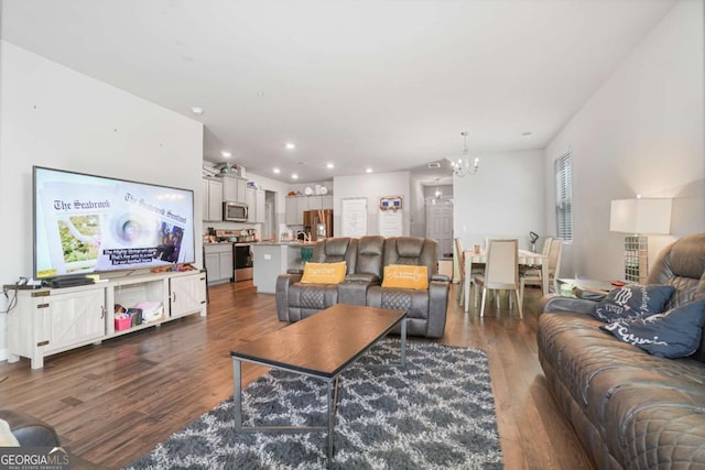 11893 Lovejoy Crossing Blvd, Hampton, GA 30228 - living area with a chandelier, dark wood-type flooring, and recessed lighting