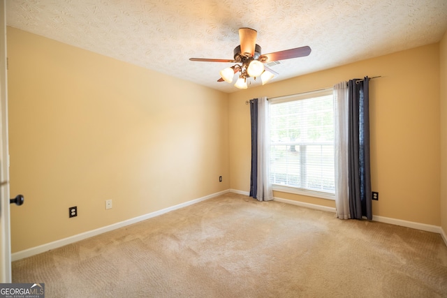 8640 Amberfield Dr, Gainesville, GA 30506 - empty room with baseboards, a ceiling fan, and carpet