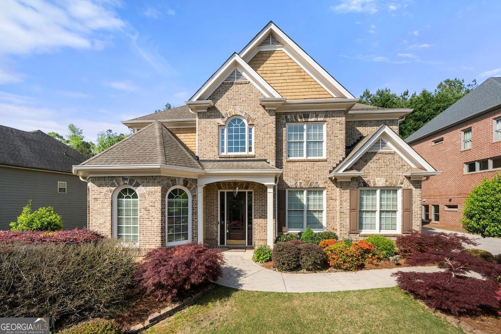 6318 Sunshine Cove Ln, Buford, GA 30518 - view of front of home featuring brick siding
