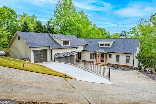 5527 Little River Cir, Gainesville, GA 30506 - view of front of property with a shingled roof, concrete driveway, a chimney, and a garage